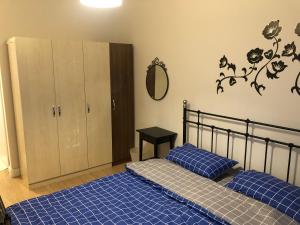 Ein Bett oder Betten in einem Zimmer der Unterkunft Hallmark Bursa