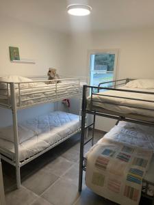 Ένα ή περισσότερα κρεβάτια σε δωμάτιο στο St Jean de Monts Maison neuve 15 pers 6ch