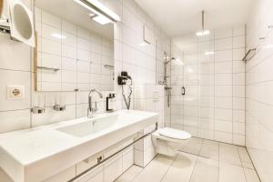Ένα μπάνιο στο Appartements im Kirchberg by A-Appartments