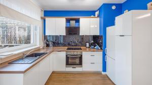 Kuchyňa alebo kuchynka v ubytovaní Apartamenty Sun&Snow Marina Primore