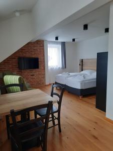 Postel nebo postele na pokoji v ubytování Apartmány Resort Na Horské