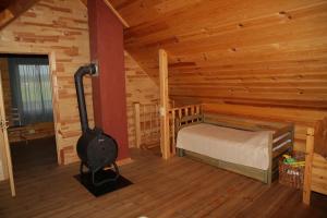 Postel nebo postele na pokoji v ubytování Pirts māja Ramatas