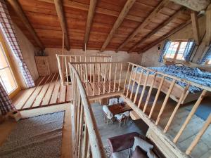 an overhead view of a room with two bunk beds at Naturstammhaus-Blockhaus in Klagenfurt