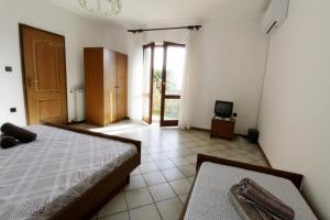 Posteľ alebo postele v izbe v ubytovaní Apartments LEO with pool