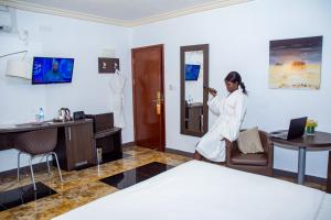 TV a/nebo společenská místnost v ubytování New Heaven Hôtel
