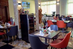 TV a/nebo společenská místnost v ubytování New Heaven Hôtel