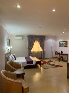 Voodi või voodid majutusasutuse Conference Hotel & Suites Ijebu toas