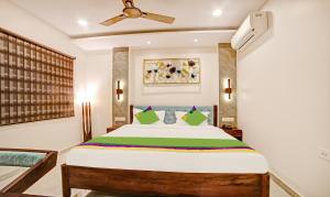 Ένα ή περισσότερα κρεβάτια σε δωμάτιο στο Treebo Lazystay Elite