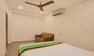 Ένα ή περισσότερα κρεβάτια σε δωμάτιο στο Treebo Lazystay Elite