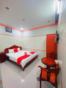 Postel nebo postele na pokoji v ubytování Chin Sao Hotel Nguyen Thi Thap