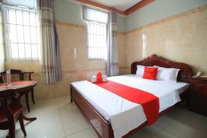 Postel nebo postele na pokoji v ubytování Chin Sao Hotel Nguyen Thi Thap
