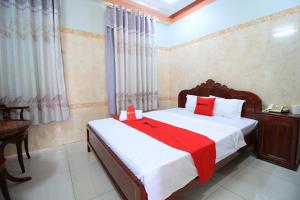 Postel nebo postele na pokoji v ubytování Chin Sao Hotel Nguyen Thi Thap