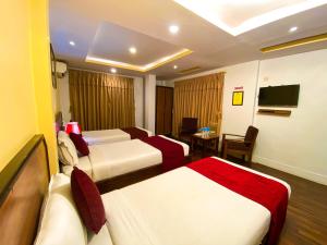 Krevet ili kreveti u jedinici u okviru objekta Thamel Grand Hotel