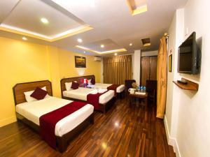 Krevet ili kreveti u jedinici u okviru objekta Thamel Grand Hotel