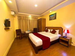 Krevet ili kreveti u jedinici u okviru objekta Thamel Grand Hotel