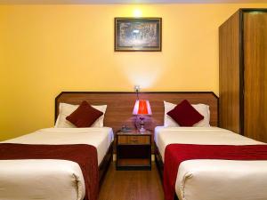 Krevet ili kreveti u jedinici u okviru objekta Thamel Grand Hotel