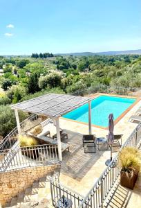 The swimming pool at or close to Trullo Falco