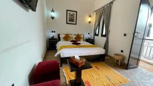 Voodi või voodid majutusasutuse Riad Dar Foundouk and Spa toas