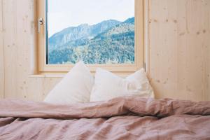 Postel nebo postele na pokoji v ubytování Pinjola