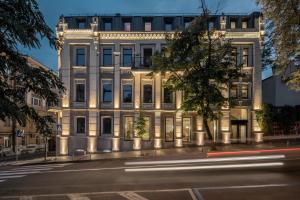 a building on the corner of a street at Sophia Hotel Kyiv in Kyiv