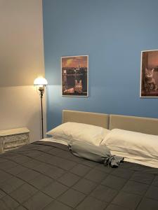 Postel nebo postele na pokoji v ubytování B&B Gloria Apartment