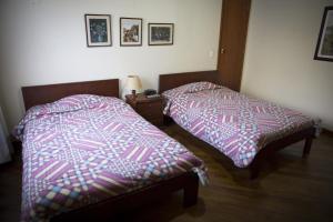 Voodi või voodid majutusasutuse Hostal Bogotá Real toas