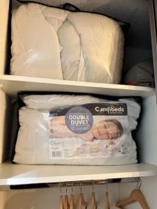 a drawer with a package of diaper drive in it at Studio moderne proche Disney Land in Bussy-Saint-Georges