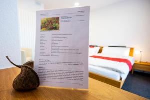 Postel nebo postele na pokoji v ubytování Hotel Ochsen Rapperswil/BE