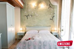 Postel nebo postele na pokoji v ubytování B&B I fiori di Marianna