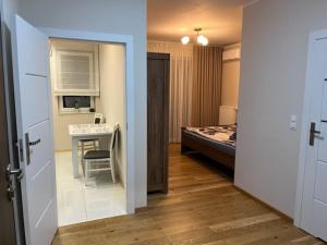 Posteľ alebo postele v izbe v ubytovaní Apartament Garbary 234 parking free