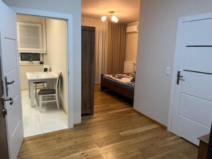 Kuchyňa alebo kuchynka v ubytovaní Apartament Garbary 234 parking free + 6 fotografií