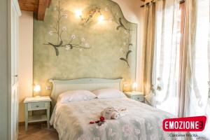 Postel nebo postele na pokoji v ubytování B&B I fiori di Marianna