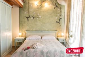 Postel nebo postele na pokoji v ubytování B&B I fiori di Marianna