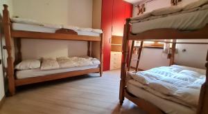 Postel nebo postele na pokoji v ubytování ALICE di SOPRA
