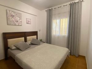 Postel nebo postele na pokoji v ubytování Ocean View Apartment at the beach Playa de La Arena