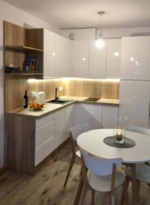 Kuchyňa alebo kuchynka v ubytovaní Apartament Cieplice Jadwigi 10