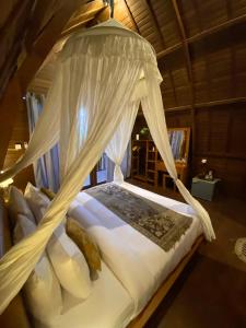 Kubu Bakas Guest House客房内的一张或多张床位