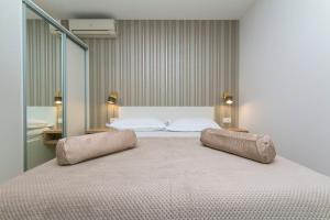 Posteľ alebo postele v izbe v ubytovaní Apartments Villa Nadalina Deluxe