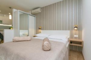 Posteľ alebo postele v izbe v ubytovaní Apartments Villa Nadalina Deluxe