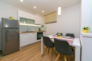 Kuchyňa alebo kuchynka v ubytovaní Apartments Villa Nadalina Deluxe