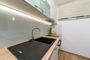 Kuchyňa alebo kuchynka v ubytovaní Apartments Villa Nadalina Deluxe