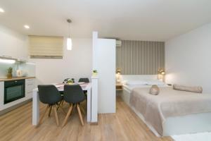 Posteľ alebo postele v izbe v ubytovaní Apartments Villa Nadalina Deluxe