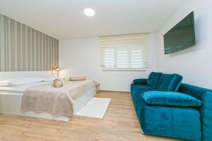 Posteľ alebo postele v izbe v ubytovaní Apartments Villa Nadalina Deluxe