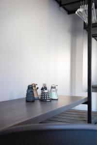 a group of pots sitting on top of a table at Bank Square Town House in Belfast