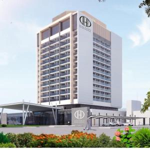 فندق هوليدي انترناشونال في الشارقة: تقديم فندق mg grand
