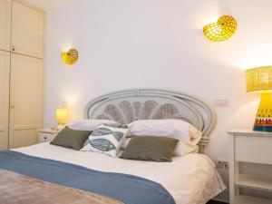 Ένα ή περισσότερα κρεβάτια σε δωμάτιο στο Live Poris Begonia 89