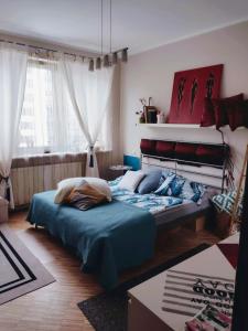 Posteľ alebo postele v izbe v ubytovaní TOtuTOtam