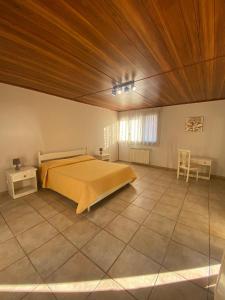 A bed or beds in a room at Hostaria delle Memorie