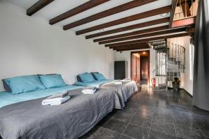 Postel nebo postele na pokoji v ubytování Edam Suites
