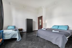 Postel nebo postele na pokoji v ubytování Edam Suites